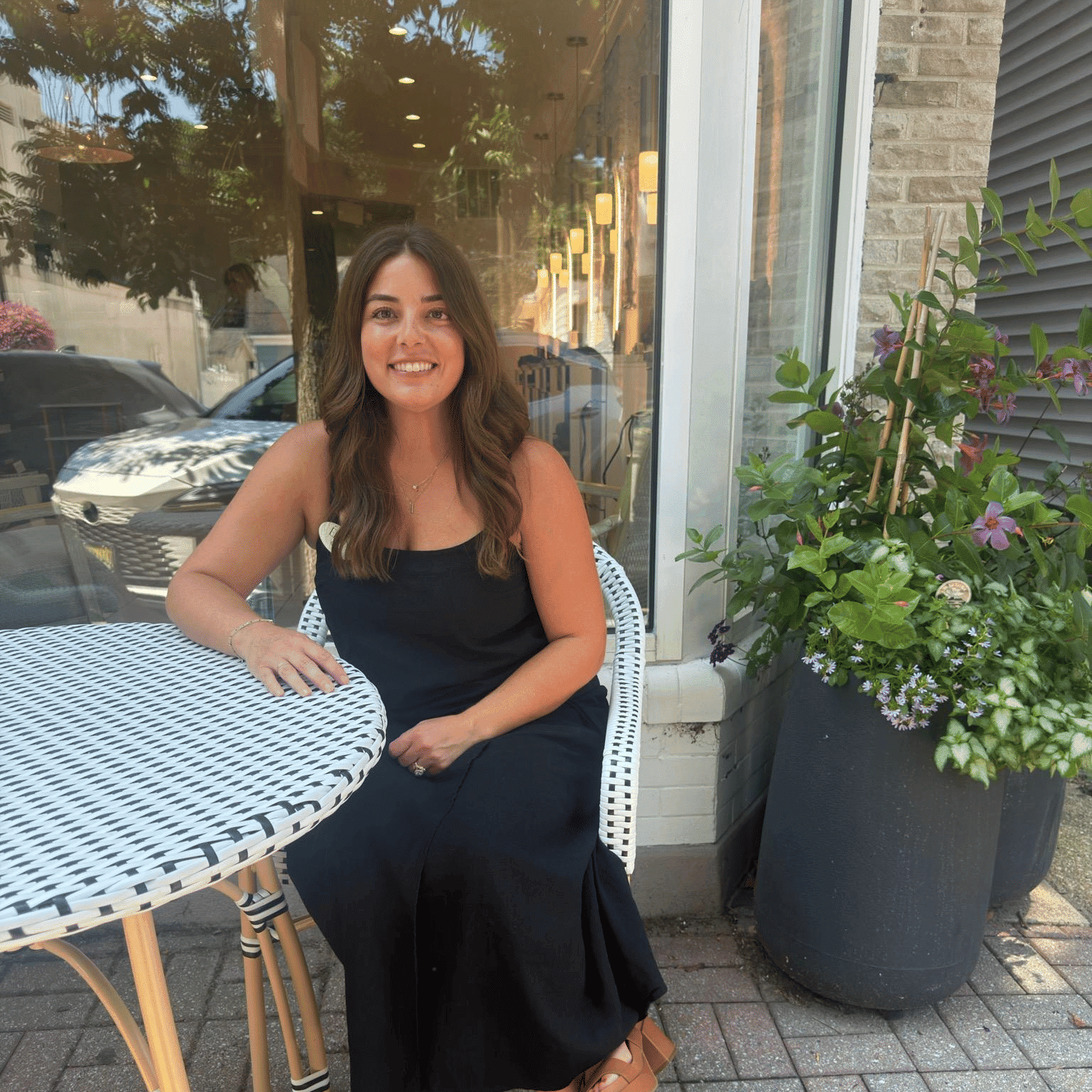Portrait of Olivia, a professional stylist at Elan Hair Studio, showcasing their expertise and style.