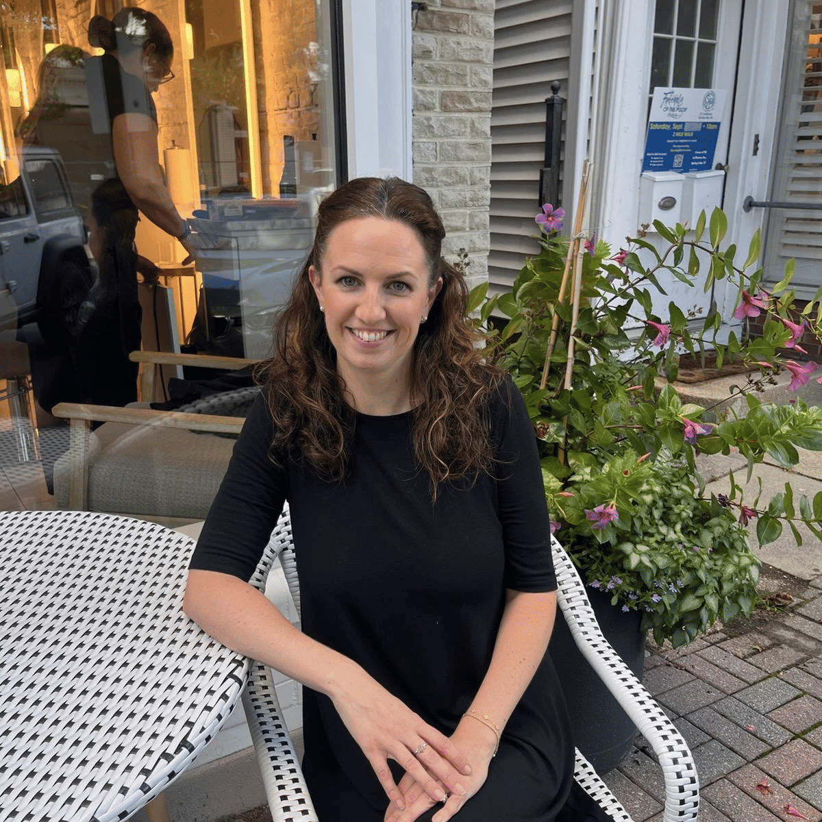 Portrait of Jennifer, a professional stylist at Elan Hair Studio, showcasing their expertise and style.